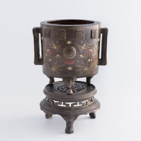 A Chinese bronze tripod censer with gold and silver inlays, 19th century