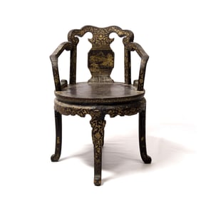 A Chinese gilt-decorated black lacquer armchair, early 19th century