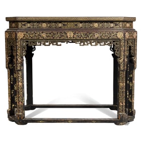 A Chinese gilt-decorated black lacquer altar table, early 19th century