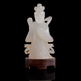 A Chinese carved white jade Guanyin, Ming dynasty or earlier