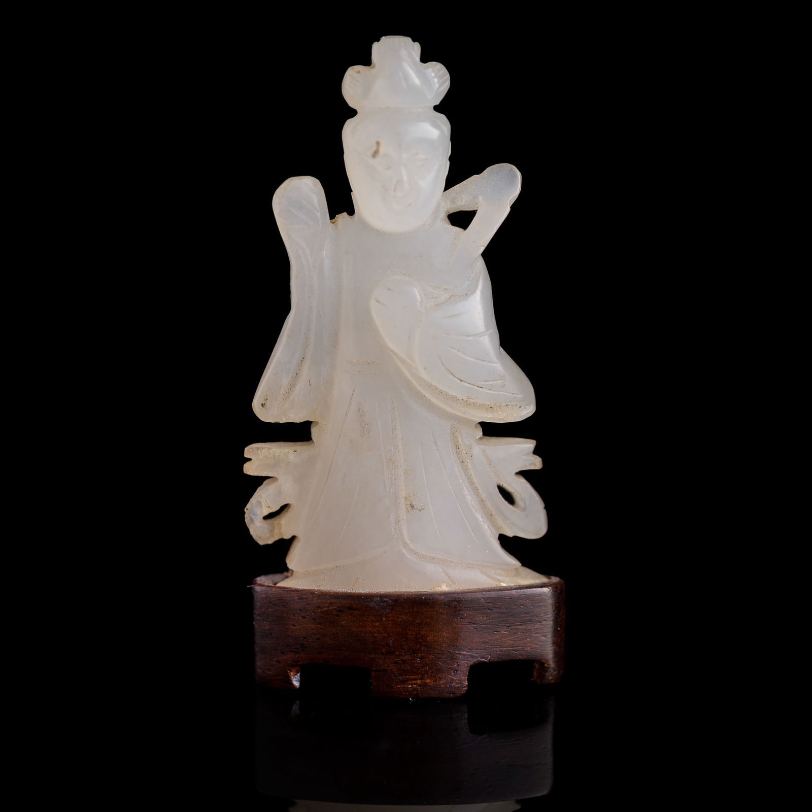 A Chinese carved white jade Guanyin, Ming dynasty or earlier
