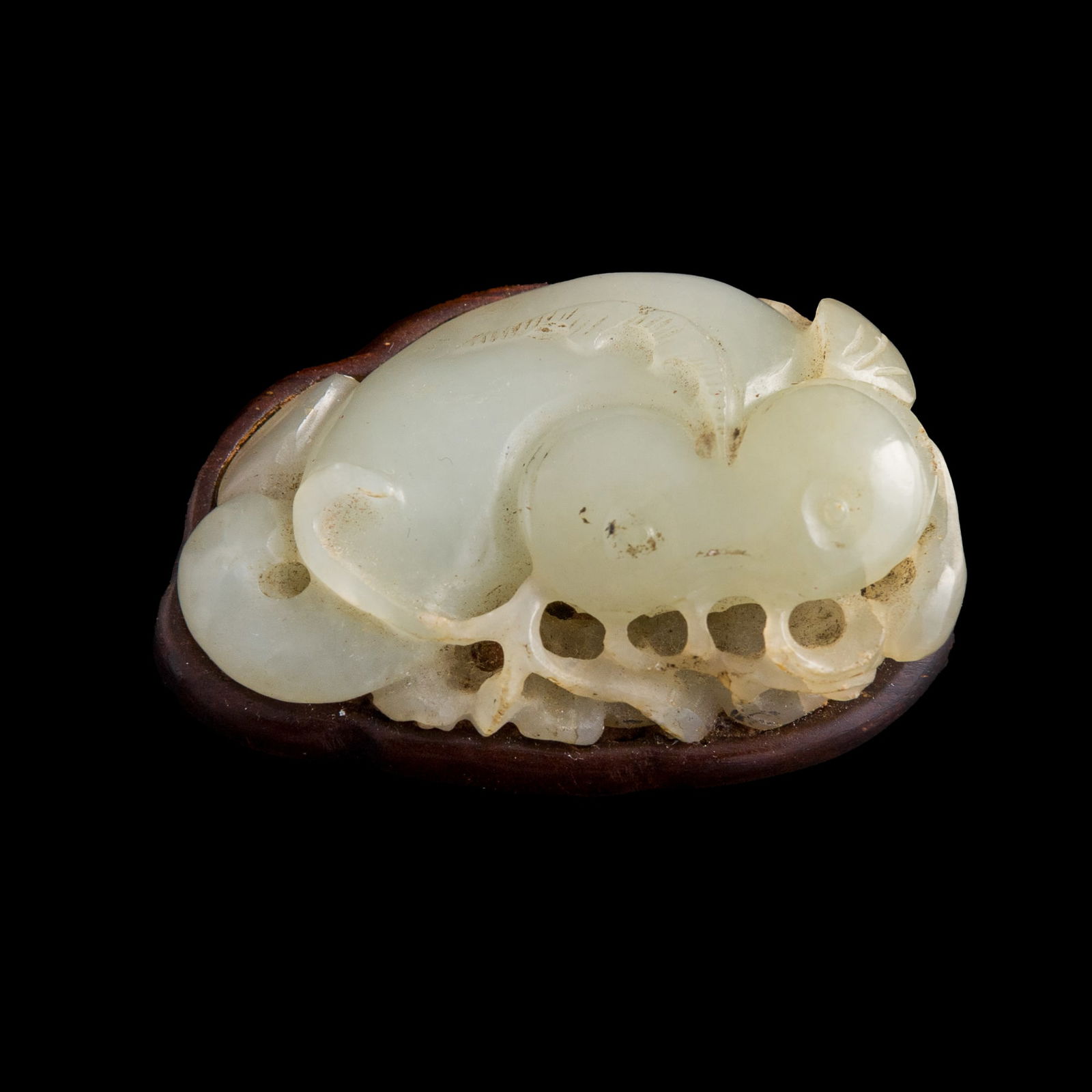 A Chinese carved white jade catfish toggle, 19th century (1 of 10)