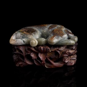 A Chinese jade dog, 18th century or earlier