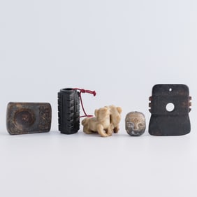 Five assorted Chinese jade pieces, Ming dynasty or earlier