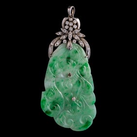 A Chinese eighteen karat gold, jadeite, and diamond pendant