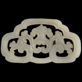 A Chinese white jade reticulated ruyi plaque, 19th century