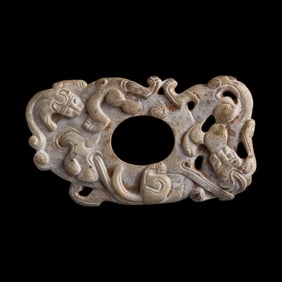 A Chinese carved jade 'chilong' bi, Warring States period