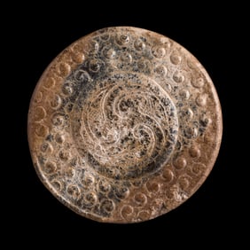 A small Chinese carved jade sword guard, Warring States period