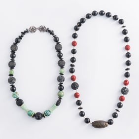 Two Chinese necklaces with assorted precious stones