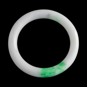 A Chinese jadeite bangle, 19th century