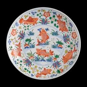 A Chinese blue and wucai 'fish' plate, Kangxi period, Qing dynasty