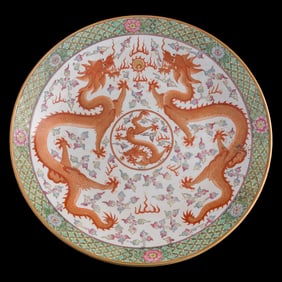 A Chinese iron red 'dragon' plate, 1950s-1970s