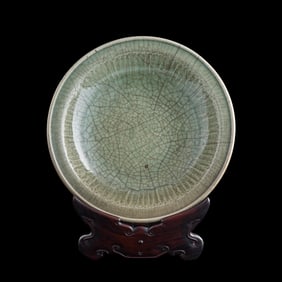 A large Chinese Longquan celadon plate, Ming dynasty