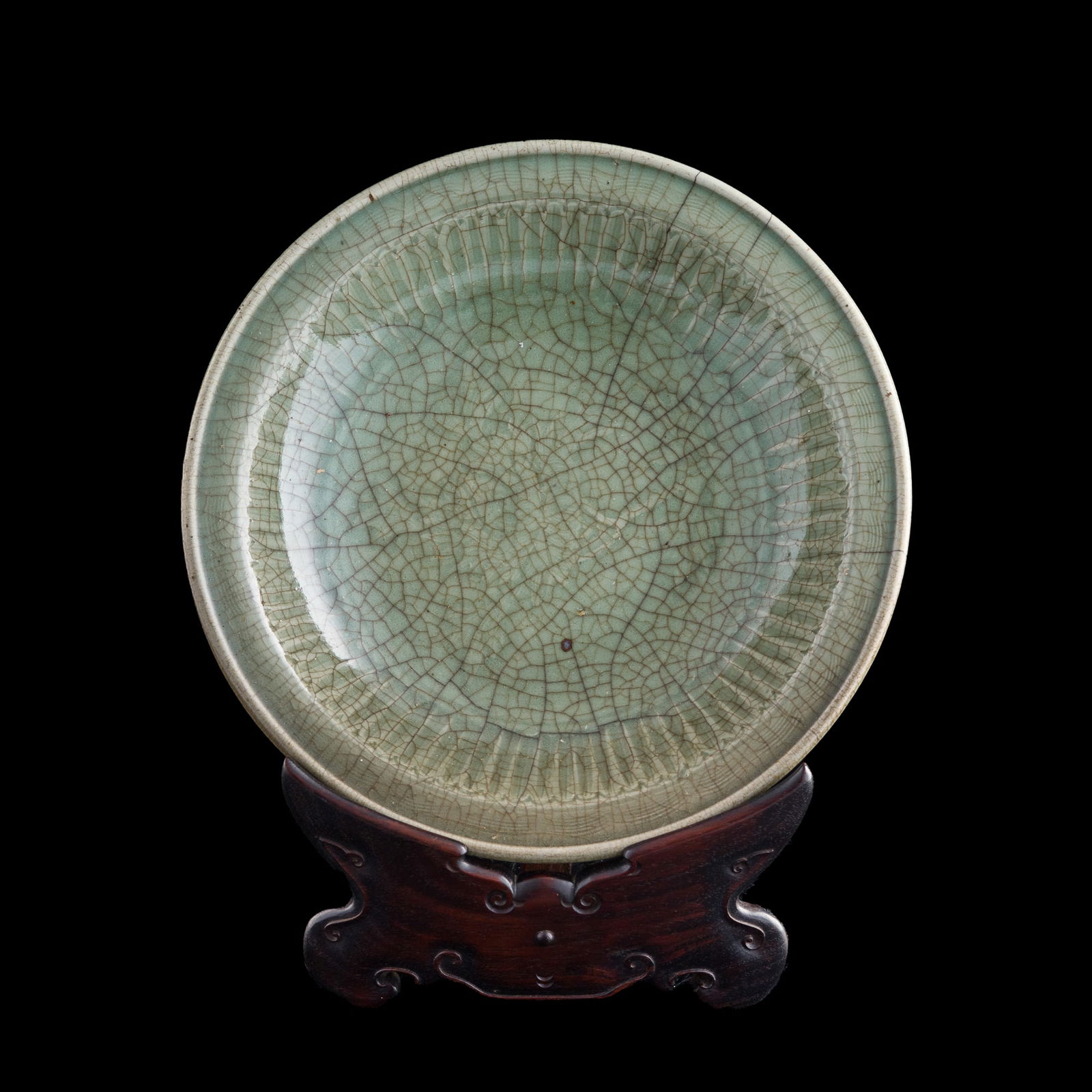 A large Chinese Longquan celadon plate, Ming dynasty (1 of 7)