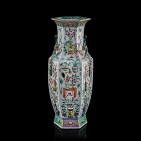 A Chinese famille rose molded 'hundred antiques' vase, 19th century