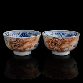 A pair of Chinese iron red 'lion' bowls, by Fang Jiazhen, late 19th century