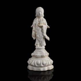 A Chinese white-glazed Buddha, 18th century