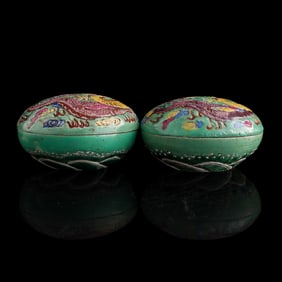 A pair of Chinese famille rose carved porcelain seal boxes, late 19th century