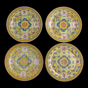 Four Chinese yellow-ground famille rose plates, Guangxu period, Qing dynasty