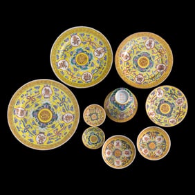 Nine yellow-ground famille rose cup, plates and dishes, Guangxu period, Qing dynasty