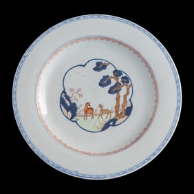 A Chinese export blue and enamel 'pine and deer' plate, 18th century