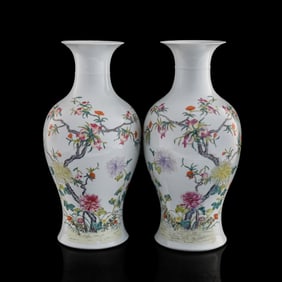 A pair of Chinese famille rose 'pomegranate' Guanyin vases, Republic period
