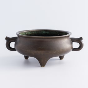 A Chinese bronze tripod incense burner, 18th century