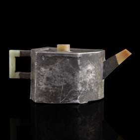 A Chinese Yixing zisha teapot with pewter encase and jade inlay, 19th century