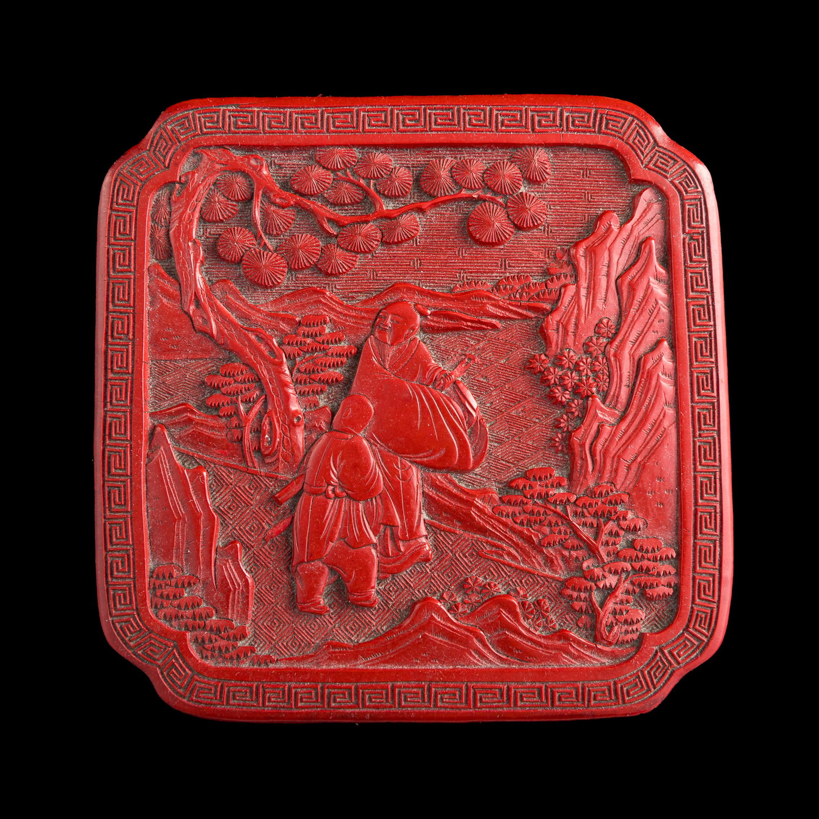 A Chinese square cinnabar 'figural' box, 19th century: A Chinese square cinnabar 'figural' box 19th century H: 2, W: 5 1/8 in. (H: 5.08, W: 13.02 cm.) From the estate of Mr. Hardy, Jacksonville, Florida. Mr. Hardy served as a CIA field agent in Asia durin