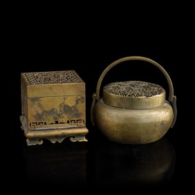A Chinese bronze incense holder and a hand warmer, 19th century