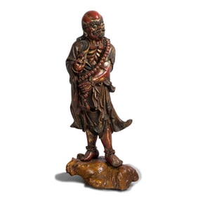 A large Chinese gilt-wood standing Luohan, early 19th century
