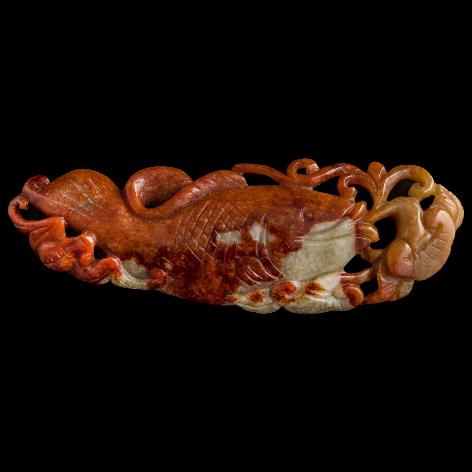 A Chinese russet jade fish pendant, 19th century (1 of 8)