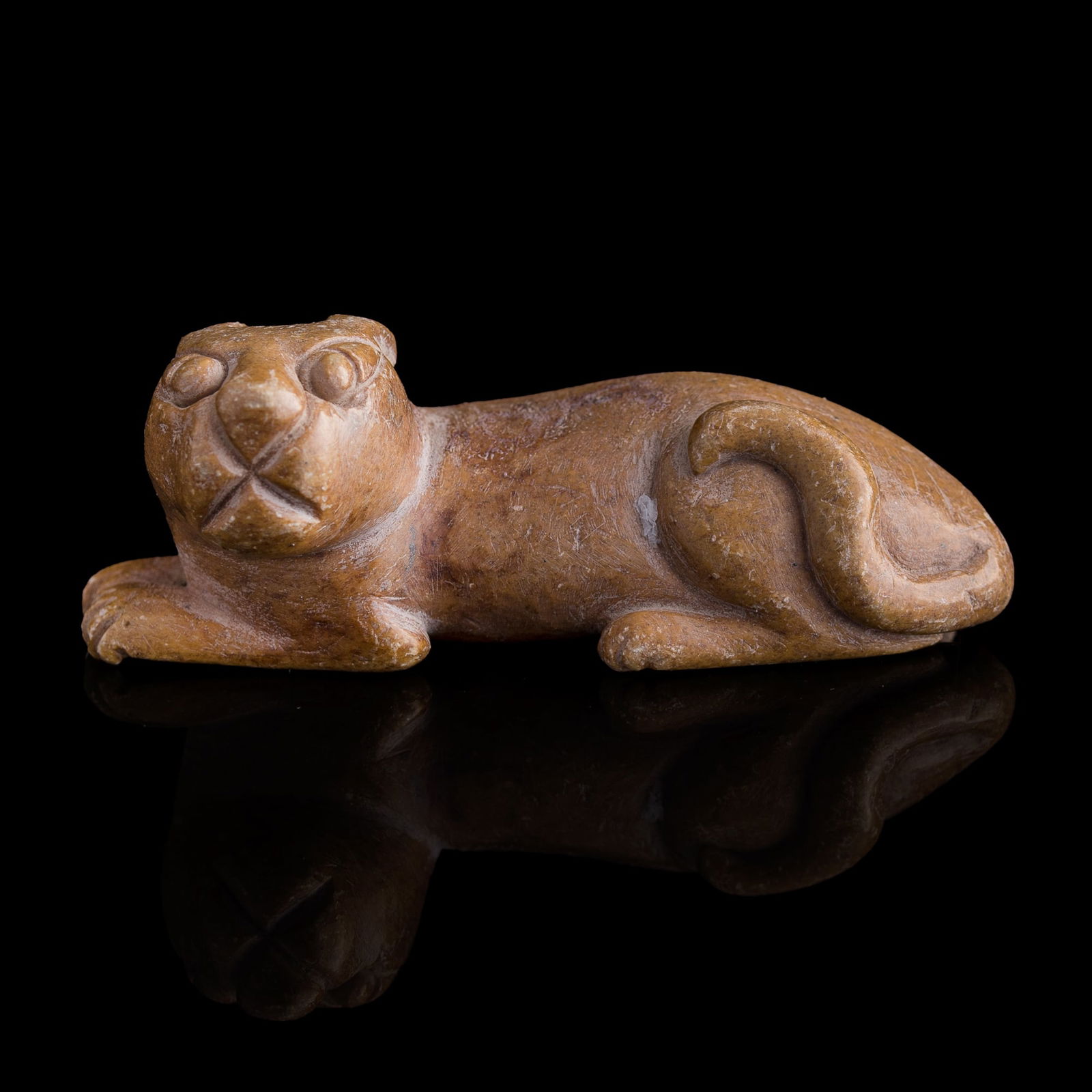 A Chinese carved jade beast, Song dynasty: A Chinese carved jade beast Song dynasty H: 1 1/8, W: 3 in. (H: 2.86, W: 7.62 cm.) From the collection of Mrs. Kwan, Northern California, acquired by descent from her parents, who collected in Hong Ko
