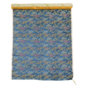 A bolt of Chinese blue-ground brocaded satin, late 19th century
