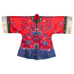 A Chinese red-ground embroidered festive robe, late 19th century