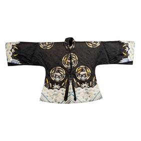 A Chinese black-ground embroidered 'crane' lady's jacket, 19th century