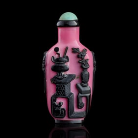 A Chinese black-overlay pink Peking glass snuff bottle, 18th century