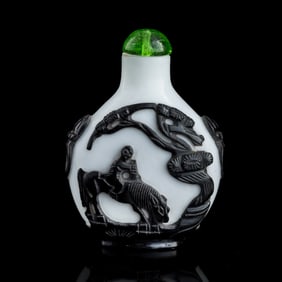 A Chinese black-overlay white Peking glass snuff bottle, 19th century