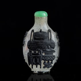 A Chinese black-overlay white Peking glass snuff bottle, 19th century