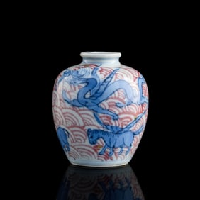 A Chinese blue and copper-red-underglazed 'sea monster' snuff bottle, 19th century