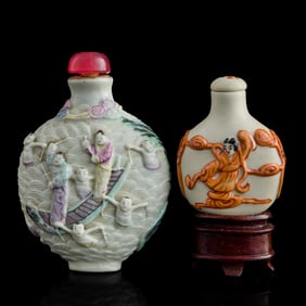 Two Chinese famille rose carved porcelain snuff bottles, 19th century
