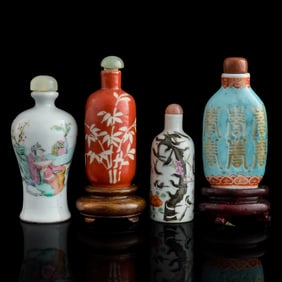 Four assorted Chinese famille rose snuff bottles, 19th century