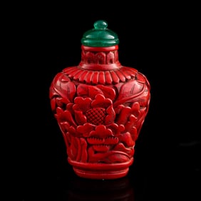 A Chinese cinnabar 'floral' snuff bottle, 18th century