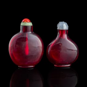 Two Chinese red Peking glass snuff bottles, 19th century