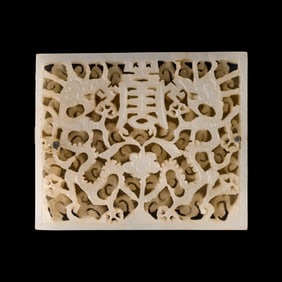 A Chinese white jade belt plaque, Ming dynasty