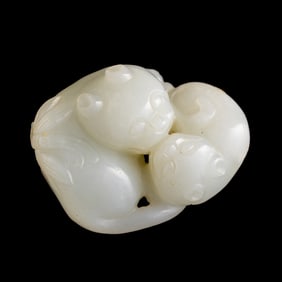 A Chinese white jade carving of double badger, 18th century
