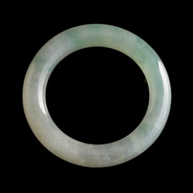 A Chinese jadeite bangle, 19th century
