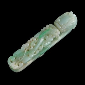 A Chinese carved jadeite dragon hook, 19th century