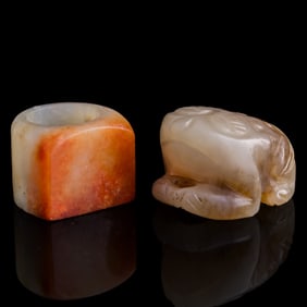 A Chinese jade archer's ring and a toad-form toggle, Ming/Qing dynasty