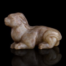 A Chinese carved jade reclining beast, Ming dynasty or earlier